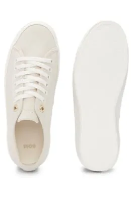 Suede lace-up trainers with branded eyelets